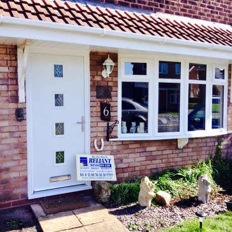 Double glazed entrance door and windows manufactured and installed by Reliant Windows